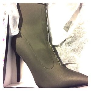 Olive green front zip boot.